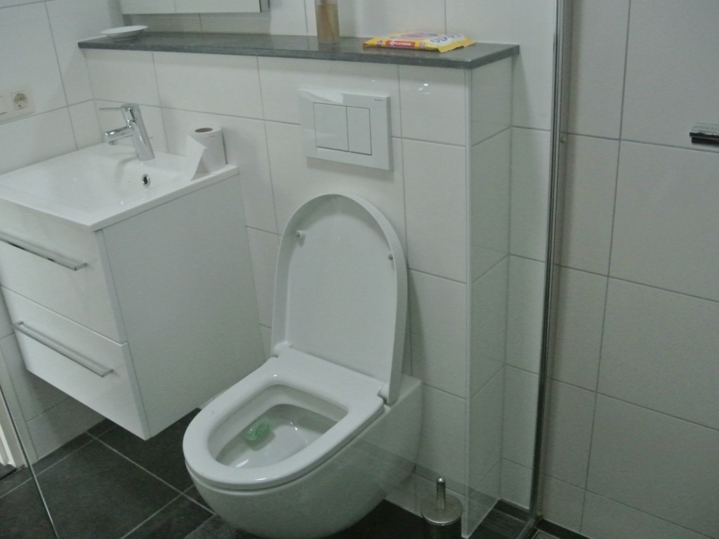 Aanbouw met badkamer, studio en garage