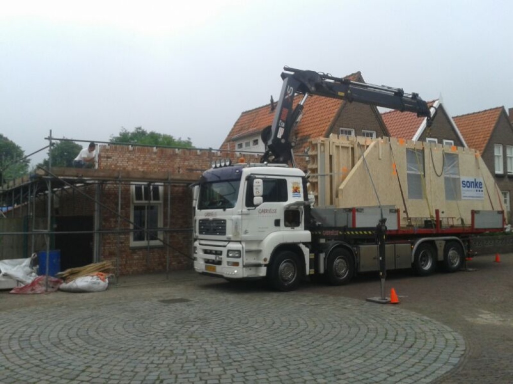 Verbouwen woning, realiseren bovenverdieping met dakkapellen en voegwerk