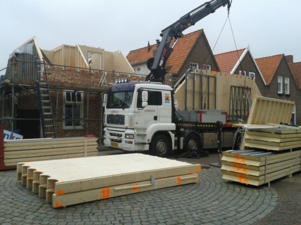 Verbouwen woning, realiseren bovenverdieping met dakkapellen en voegwerk