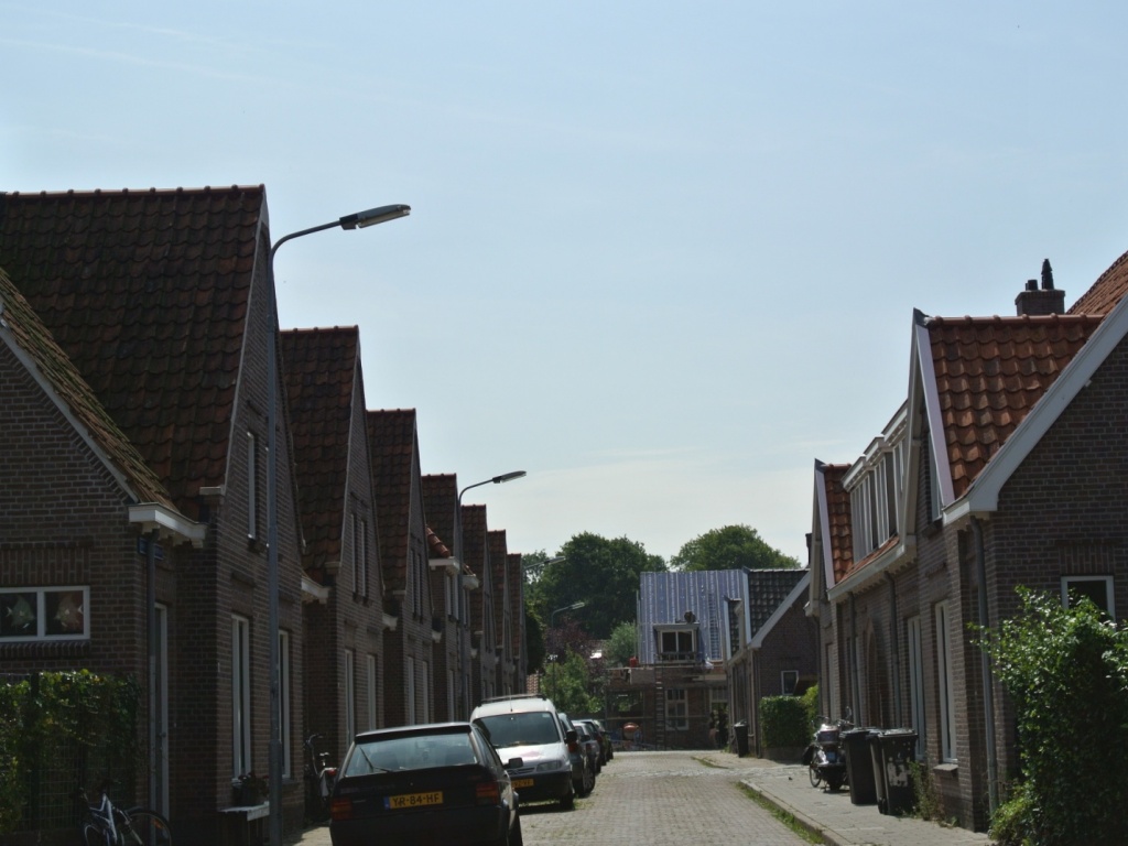 Verbouwen woning, realiseren bovenverdieping met dakkapellen en voegwerk