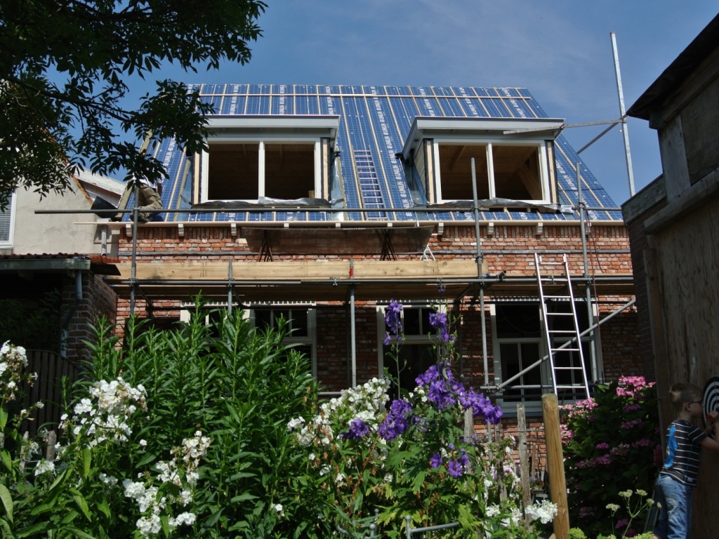 Verbouwen woning, realiseren bovenverdieping met dakkapellen en voegwerk