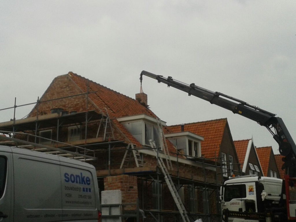 Verbouwen woning, realiseren bovenverdieping met dakkapellen en voegwerk