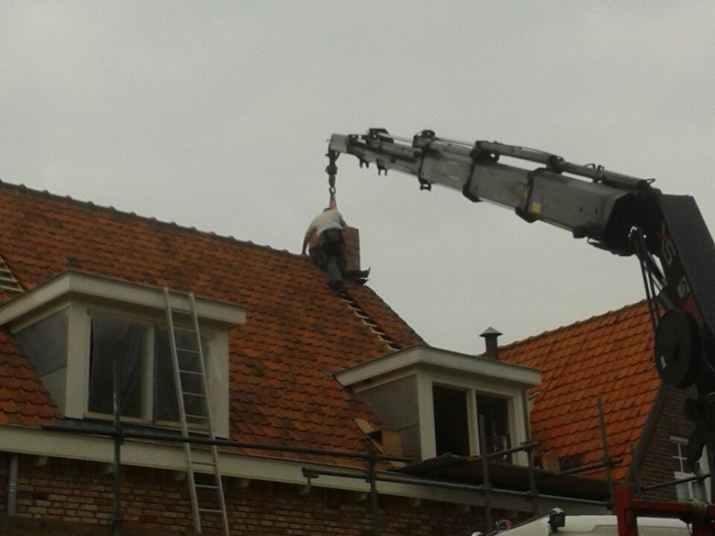 Verbouwen woning, realiseren bovenverdieping met dakkapellen en voegwerk